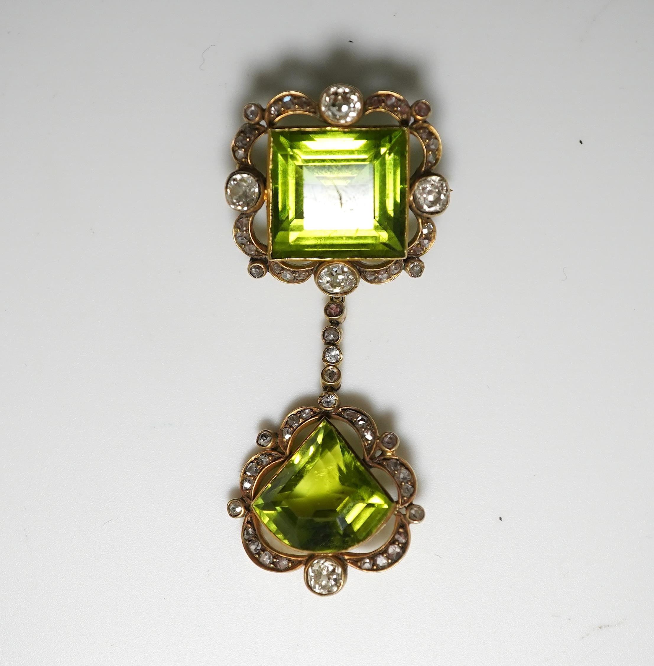 A peridot and diamond brooch, circa 1900